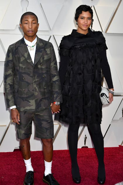 Red Carpet Gemstones & Trends at the Oscars 2019 - Image 7 Red carpet gemstones - Pharrell Williams and Helen Lasichan on the Oscars Red Carpet 2019